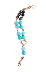 jewerly bracelet  with chalcedony and obsidian around white background