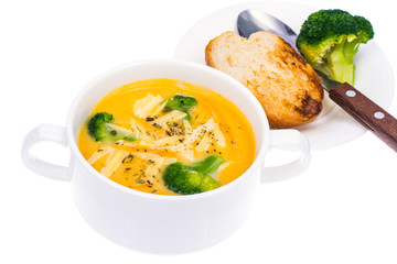 White bowl with chicken cheese broccoli soup