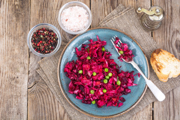 Vinaigrette salad with beets, potatoes, carrots and peas