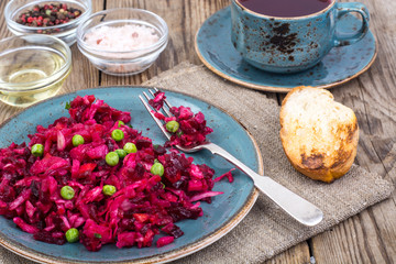 Vinaigrette salad with beets, potatoes, carrots and peas