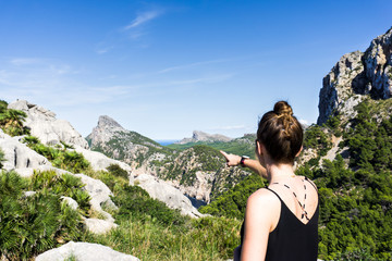 Girl looking on beautiful landscape,