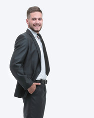 side view.smiling businessman looking at the camera