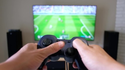 Gamepad in the player's hands - Powered by Adobe