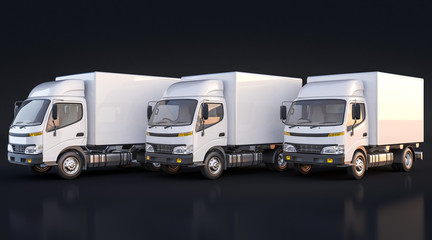 Isolated Delivery Trucks on Black Background