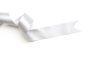 silver ribbon bow in bright silver white grey color isolated