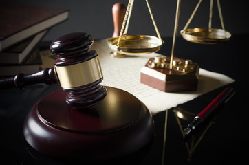 Court gavel, scale of justice, law theme.