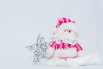 Adorable pink Santa Claus and silver star with white background. Christmas