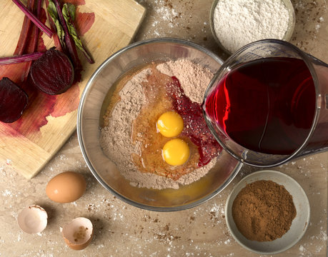 Pouring in the Beet Juice for Red Velvet Cupcakes
