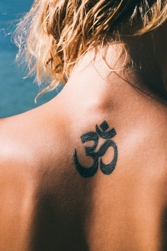 Woman's Tattoo on the Back