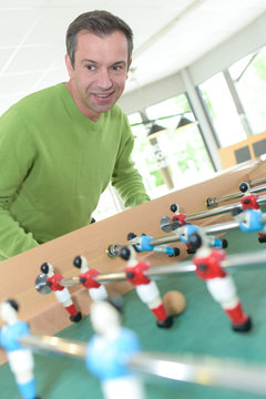 man playing table football