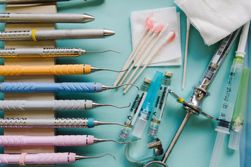 Dental hygienist tools laid out on a tray
