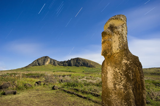 South America, Chile, Rapa Nui, Isla de Pascua (Easter Island), lone monolithic giant stone Moai statue illuminated with moonlight at Tongariki