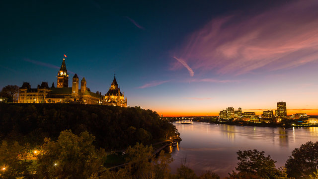 Beautiful View of Canadian Parliament, Ottawa River and Gatineau Skyline at Dusk