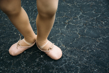 Child's Feet in Ballet Shoes