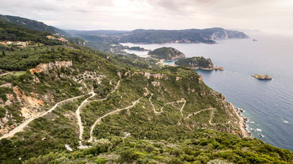 scenic view down from the highest mount (Pantocrator) on the Ionian Island Corfu, Greece. White...