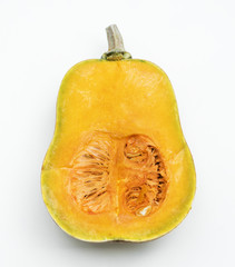 Closeup of fresh butternut squash on white background