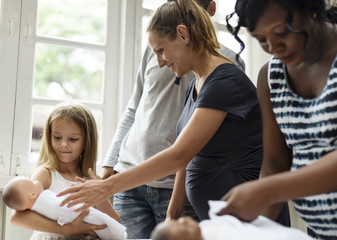 Pregnant women in a class