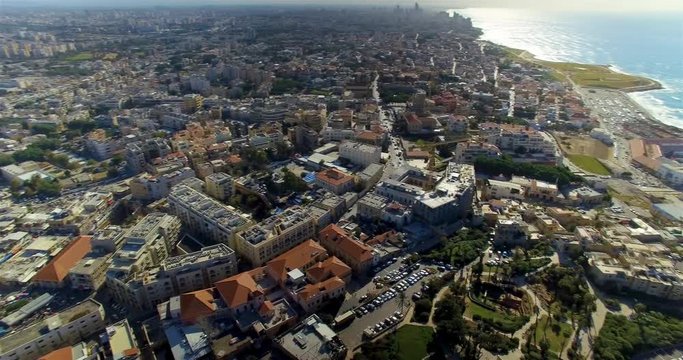 High aerial shot over Tel Aviv on the shore of the Mediterranean Sea