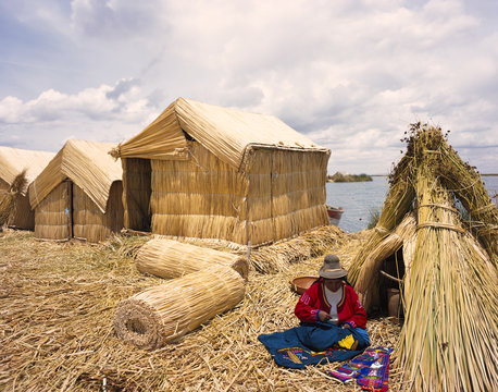 Woman in traditional costume on the Uros islands. Puno. Peru.