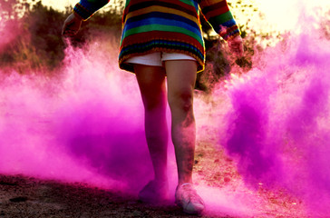 Obraz na płótnie Canvas Person having fun with pink powder