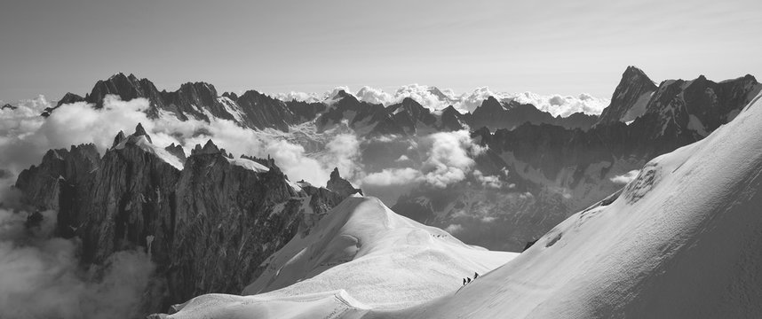 Panorama of three aplinists climbing to montblanc. Beautiful Landscape, France.