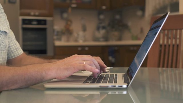 Man Hands Typing On A Laptop Keyboard and remove the flash card