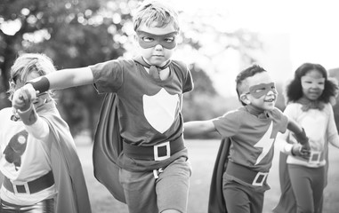 Kids Wear Superhero Costume Outdoors