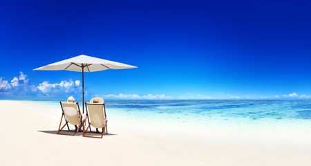 Couple relaxing at a beach in Samoa
