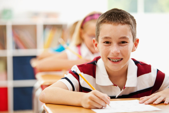 Classroom: Cute Schoolboy with Braces