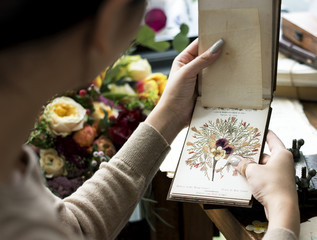 Hands Holding Dry Flowers Plants Collection Notebook