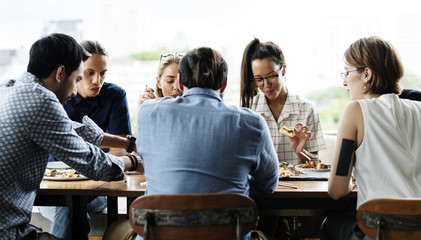 People around the food table