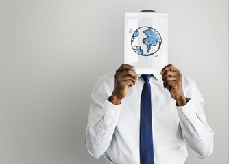 Businessman digital tablet face covered with global symbol