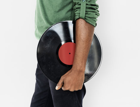 Man Holding A Vintage Vinyl Record