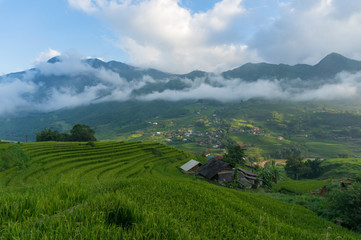 Fototapeta na wymiar High mountain village with rice terraces landscape