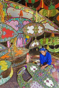 Asia, Malaysia, Kelantan State, Kota Bharu, Master Kite-maker constructing his world famous Kites