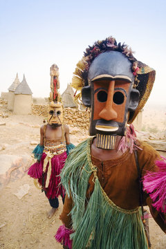 Africa, West Africa, Mali, Dogon Country, Bandiagara escarpment, Masked Ceremonial Dogon Dancers near Sangha