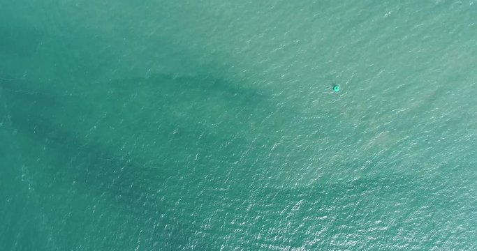 Aerial view flying over tropical blue ocean in thailand