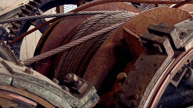 Ghost town gold mine Oregon Old giant rusted industrial gears and cables from a dredge 2