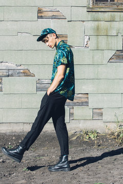 Super stylish teenage guy, outdoors