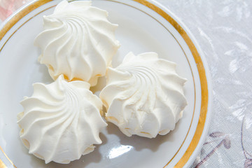 Sweet marshmallows on plate