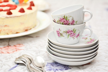 A lot of cups with tea