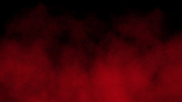 Red smoke on the black background