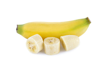 whole and portion cut ripe banana fruit on white background © yodaswaj