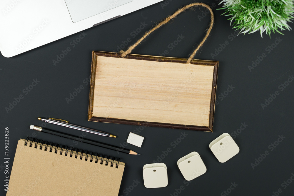 Poster business office work desk table with computer laptop , note and stationery on black table background