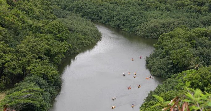 Kauai Hawaii canoe kayak Wailua River State Park. Oldest Hawaiian Island. Garden Isle. Waimea Canyon Park, Na Pali coast. Volcanic mountain geology. Economy tourism based. agriculture tropical.