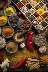 Close-up of different types of Assorted Spices in a wooden box