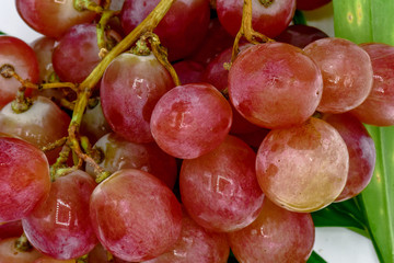 Food for health,Red seedless grapes,The red grape seeds and galling.Red grapes without seed, fresh fruit concept, close up red grapes