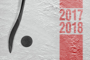 Hockey stick and washer on ice, season 2017-2018