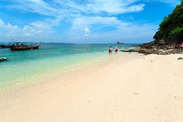 Kai island, Phuket, Thailand. Small tropical island with white sandy beach and blue transparent water of Andaman sea.