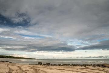 Beautiful scenic landscape with dramatic cloudy sky at sunset